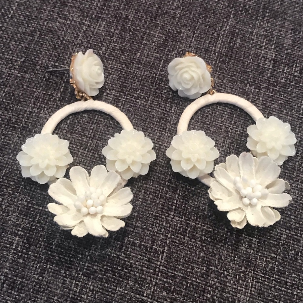 White floral statement earrings